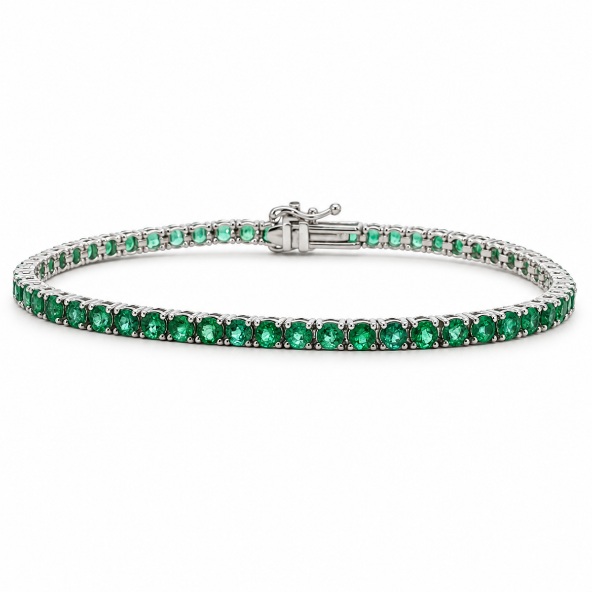 PULSERA EN ORO BLANCO CON ESMERALDAS