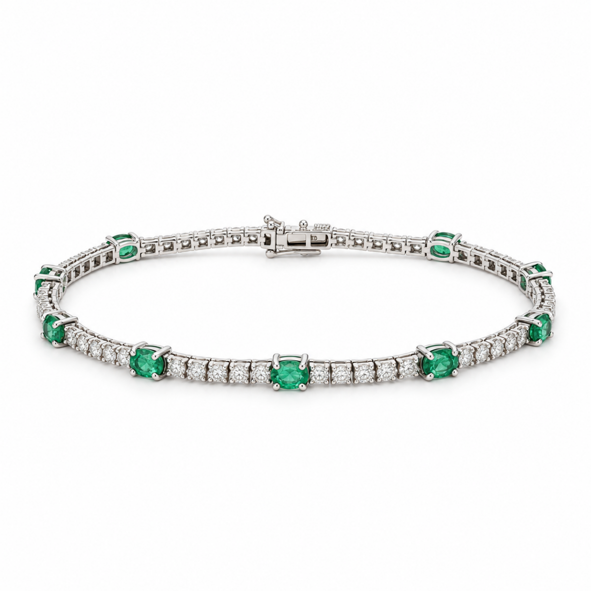 PULSERA EN ORO BLANCO CON ESMERALDAS Y DIAMANTES