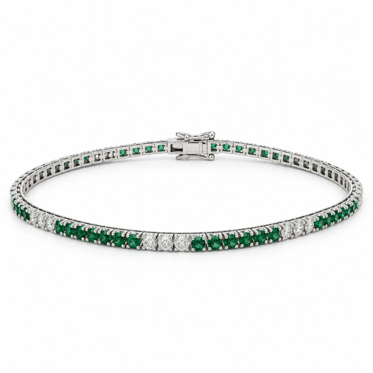 PULSERA EN ORO BLANCO CON DIAMANTES Y ESMERALDAS