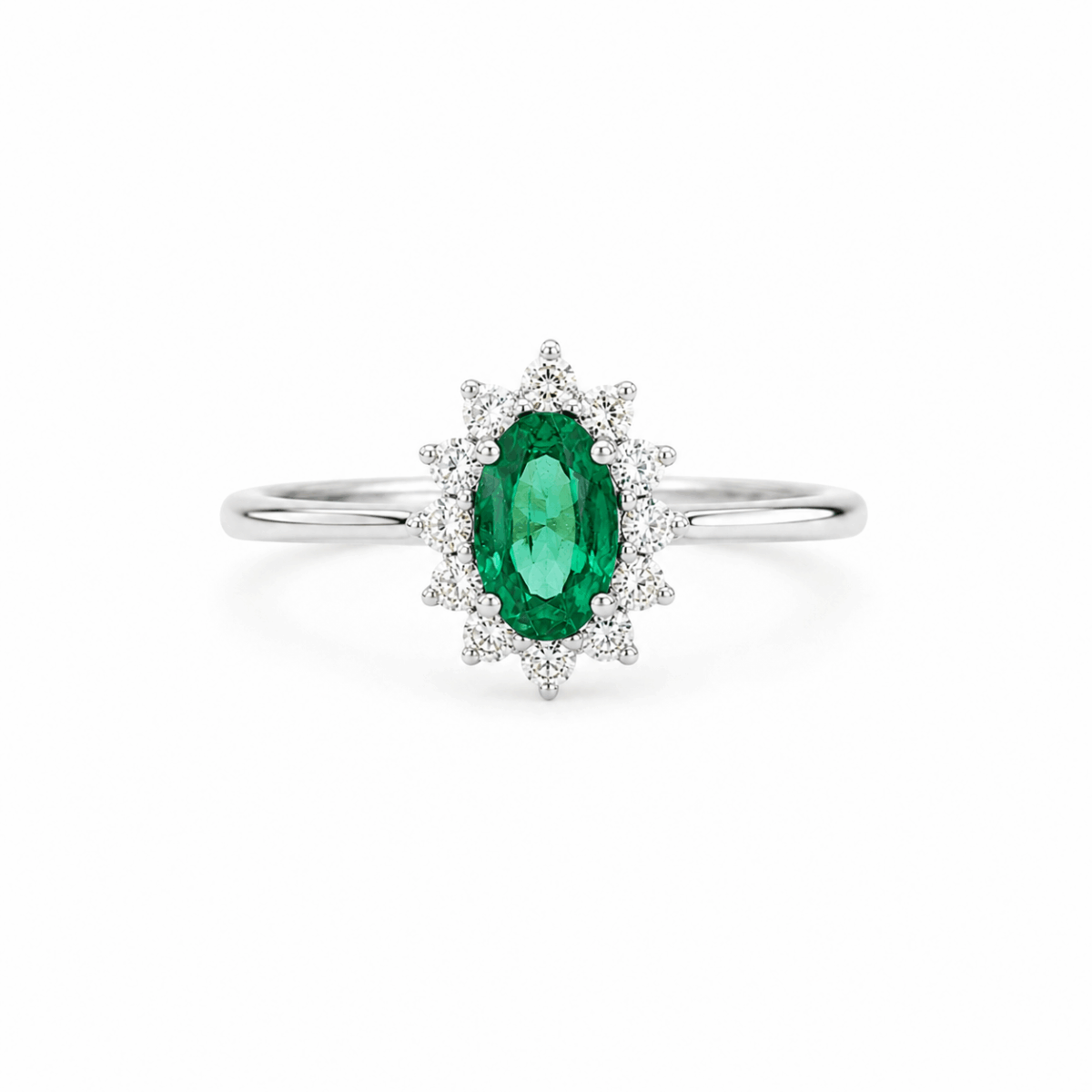 ANILLO DE ORO BLANCO CON ESMERALDA OVALADA