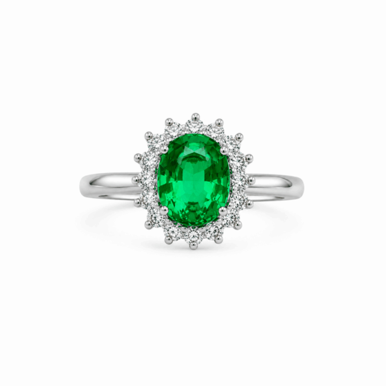 ANILLO DE ORO BLANCO CON DIAMANTES Y ESMERALDA